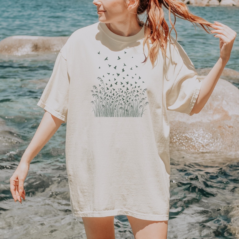 Flock Rising from the Grass Under a Crescent Moon Tee
